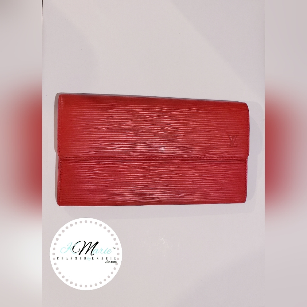 LOUIS VUITTON.                               Pochette Port Mon Wallet